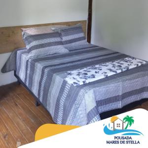 Кровать или кровати в номере Pousada Mares de Stella