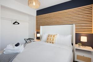Letto o letti in una camera di Mojave Midnight Oasis