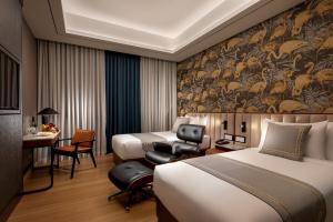 Sayarsan Hotel Yangon客房内的一张或多张床位