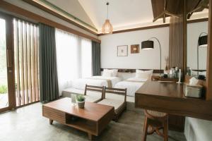 Ein Bett oder Betten in einem Zimmer der Unterkunft LAYANA FARMSTAY