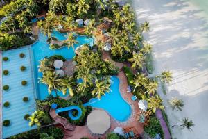 an overhead view of a pool at a resort at Dusit Beach Resort Guam in Tumon