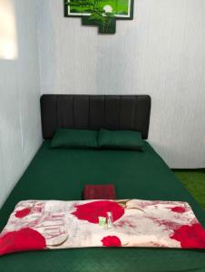 מיטה או מיטות בחדר ב-Nio Homestay and Tour