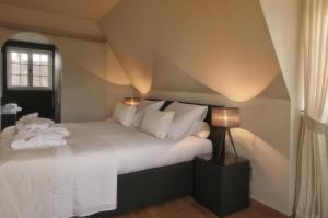 Postel nebo postele na pokoji v ubytování B&B Colombe Blanche