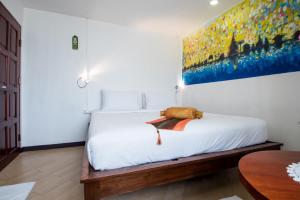 Postel nebo postele na pokoji v ubytování Chedi Home
