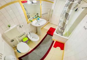an overhead view of a bathroom with a sink and a toilet at Fortune Guest house in Lisbon +83 photos