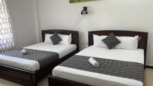 Voodi või voodid majutusasutuse Blue Diamond Resort toas