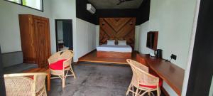 Postel nebo postele na pokoji v ubytování Mango Tree Villa Bentota