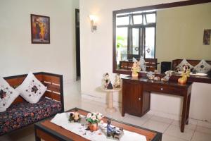 Posezení v ubytování Roemah Canting Homestay