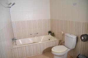Koupelna v ubytování Roemah Canting Homestay