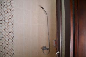 Koupelna v ubytování Roemah Canting Homestay