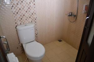 Koupelna v ubytování Roemah Canting Homestay
