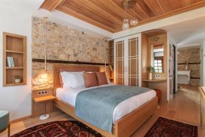 Ένα ή περισσότερα κρεβάτια σε δωμάτιο στο Αρχοντικό Κίτσου - BOUTIQUE HOTEL