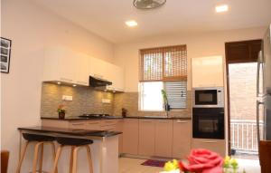 Kuchyň nebo kuchyňský kout v ubytování Square One CONDO - Kiribathgoda Kelaniya