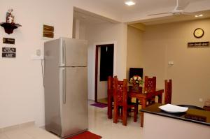 Kuchyň nebo kuchyňský kout v ubytování Square One CONDO - Kiribathgoda Kelaniya