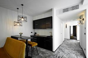 Sjónvarps- og/eða afþreyingartæki á Miramare Magnetic Beach Hotel