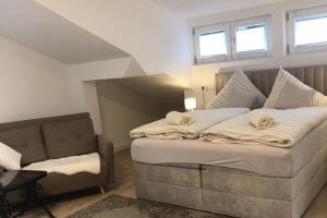 Postel nebo postele na pokoji v ubytování Ferienwohnung Bullaku