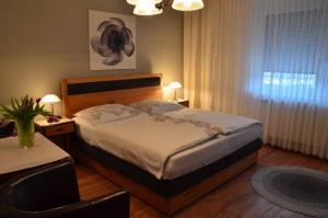 Postel nebo postele na pokoji v ubytování Gästezimmer Klinger-Tongisch