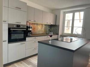 Η κουζίνα ή μικρή κουζίνα στο Ferienwohnung MaRe