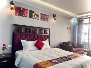 Postel nebo postele na pokoji v ubytování Sapa Hills Hotel