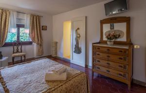 Postel nebo postele na pokoji v ubytování Villa Le Querciolaie