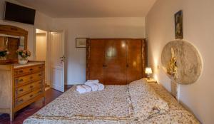 Postel nebo postele na pokoji v ubytování Villa Le Querciolaie
