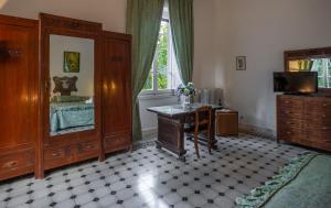 Kuchyň nebo kuchyňský kout v ubytování Villa Le Querciolaie