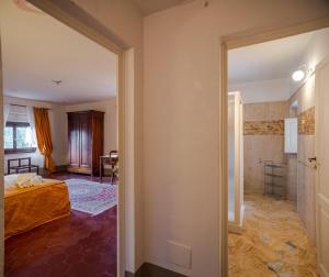 Postel nebo postele na pokoji v ubytování Villa Le Querciolaie