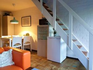 Kuchyň nebo kuchyňský kout v ubytování Welkom in DeKreek V59, dem freundlichen Ferienhaus