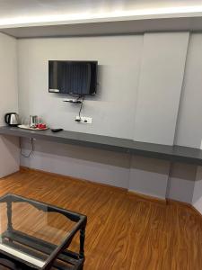 Kuchyň nebo kuchyňský kout v ubytování Hotel SV International