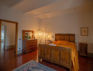 Postel nebo postele na pokoji v ubytování Villa Le Querciolaie