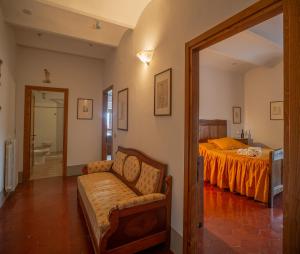 Postel nebo postele na pokoji v ubytování Villa Le Querciolaie