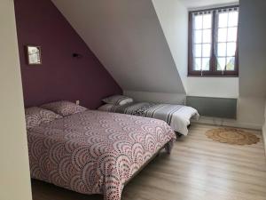Postel nebo postele na pokoji v ubytování Maison de vacances