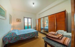 Postel nebo postele na pokoji v ubytování Tempio Pausania Solar private apartment 30 minutes from the sea - Appartamento solare a 30 minuti dal mare