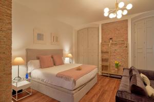 Posteľ alebo postele v izbe v ubytovaní City Suite