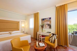 Postel nebo postele na pokoji v ubytování Antica Fornace Relais by La Principina