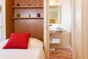 Postel nebo postele na pokoji v ubytování Antica Fornace Relais by La Principina