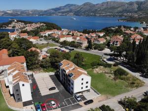 an aerial view of a town with a lake at Apartment Skyline two-bedroom apartment with balcony in Cavtat