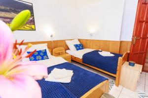 Postel nebo postele na pokoji v ubytování Retel Vitez Vendégház