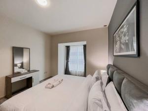Postel nebo postele na pokoji v ubytování StoneTree - Elite Residence 1 BR - Near Dubai Tram