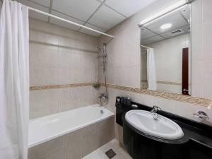 Koupelna v ubytování StoneTree - Elite Residence 1 BR - Near Dubai Tram