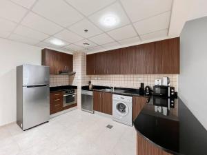Kuchyň nebo kuchyňský kout v ubytování StoneTree - Elite Residence 1 BR - Near Dubai Tram