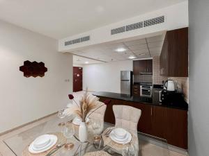 Kuchyň nebo kuchyňský kout v ubytování StoneTree - Elite Residence 1 BR - Near Dubai Tram