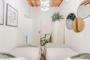 A bed or beds in a room at Iole