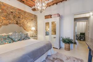 A bed or beds in a room at Iole