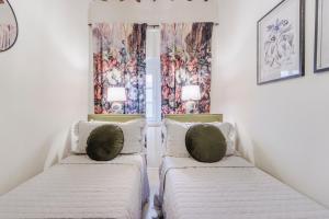 A bed or beds in a room at Iole