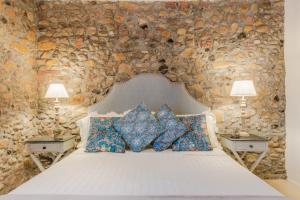A bed or beds in a room at Iole