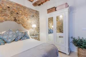 A bed or beds in a room at Iole