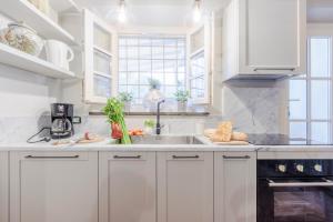 A kitchen or kitchenette at Iole