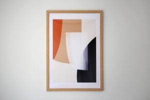 a picture hanging on a white wall at Pirane House 201 東京スカイツリー浅草 押上駅が徒歩圏内 無料wifi in Tokyo