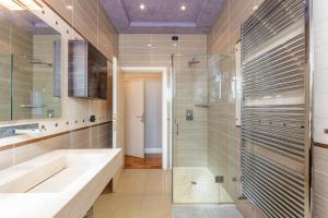 a bathroom with a sink and a shower at Casa Fiorita in Cerreto Guidi